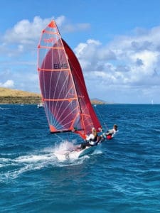 Two sailors lean against the wind as the sail their 29. (Photo by Becky Rasmussen)