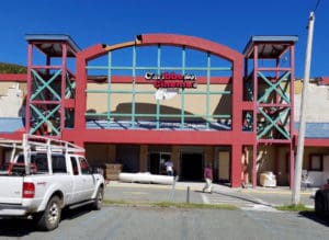 Workers prepare Caribbean Cinemas for a reopening this month. (sap photo)