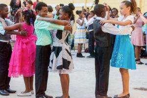 Students from two different schools who don’t know each other dance together, demonstrating that, if you can dance, you can dance with anyone. (Photo by Aisha Zakiya Boyd, Dancing Classrooms)