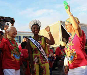 From left, 1952 Carnival Queen Carmen Sibilly joins 2018 Carnival Queen Jikelle Michael and Judy Watson for Friday’s opening of the Carnival village, named in Watson's honor.