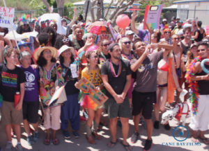 Enthusiastic opponents of discrimination and supporters of equality and dignity for everyone lined the Pride Parade route in Frederiksted Saturday. (Photo provided by Johanna Bermùdez-Ruiz and Cane Bay Films)