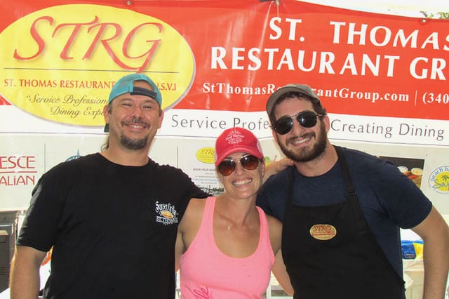Drew Rawlins-Kinsman, Jessica Hume and Scott Friedman represented the St. Thomas Restaurant Group, a locally owned collection of differently themed eateries. (Gerard Sperry photo)