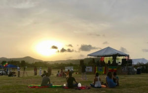 Festival goers begin to set up picnic blankets as the sun sets at the V.I. Royal Fest and Wellness Conference. (Elisa McKay photo)