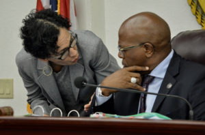 Sens. Nereida Rivera-O'Reilly (D-STX) and Myron Jackson (D-STT) confer during session Monday. (Photo by Barry Leerdam for the V.I. Legislature)