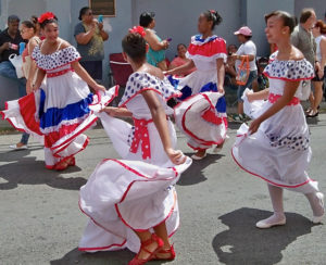 In 2013, the V.I.-Puerto Rico Friendship parade swirls colorfully down the streets of CHristiansted on the way to the Canegata Ballpark. (File photo)