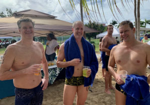 From left, Ricardo Valdivia of Miami, Rob Jones of Charlottesville, Virginia, and Bob Halk of St Croix chat about the sea life they spotted while swimming from Buck Island to the Buccaneer Hotel in the 2018 Coral Reef Swim. (Anne Salafia photo)