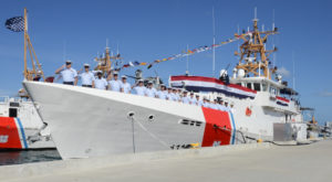 The crew of the Coast Guard Cutter Joseph Napier salute during the commissioning ceremony in 2016. (U.S. Coast Guard photo by Petty Officer 2nd Class Mark Barney)