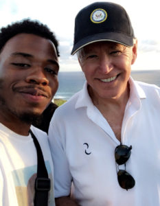 St. Croix resident Devin Boyd with former Vice President Joe Biden at Point Udall shortly after dawn, Jan. 1. (Devin Boyd photo provided by Alice Henry)