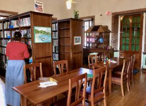 A visitor browses at the Sprauve Library. (Amy Roberts photo)