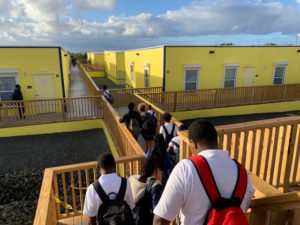 Students head for their new homerooms at Arthur Richards Jr. High on their first day back on their own campus. (Anne Salafia photo)