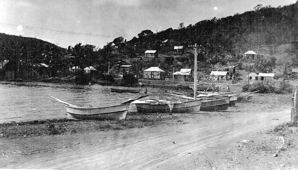 Fishing boats on the beach, ready for launching.