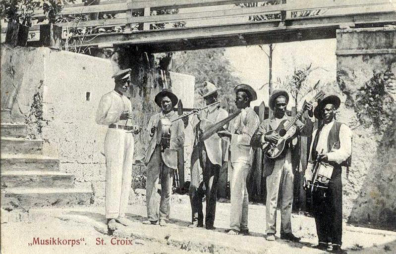 This St. Croix band during the Danish period has several elements of later quelbe or scratch music bands, including flute, such as Stanley Jacobs plays with the Sleepless Knights today; the gourd as a percussion instrument and guitar.