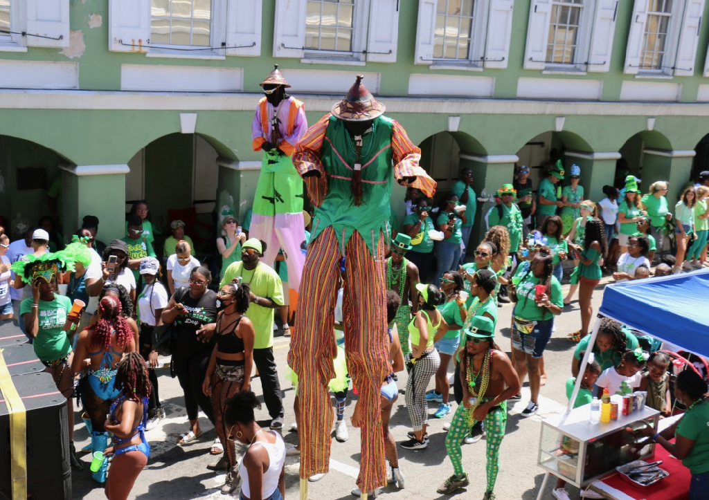 For a day, their green garb makes these moko jumbies the tallest leprechauns anyone's ever seen. (Linda Morland photo)