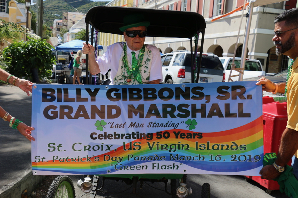Grand Marshall Billy Gibbons rides through town as "the last man standing" of those who organized the first St. Patrick's Day parade on St. Croix 50 years ago. (Linda Morland photo)