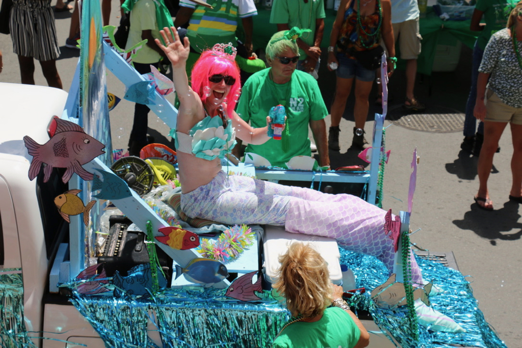 A mermaid blows bubbles as the St. Patrick's Parade rolls through town. (Linda Morland photo)