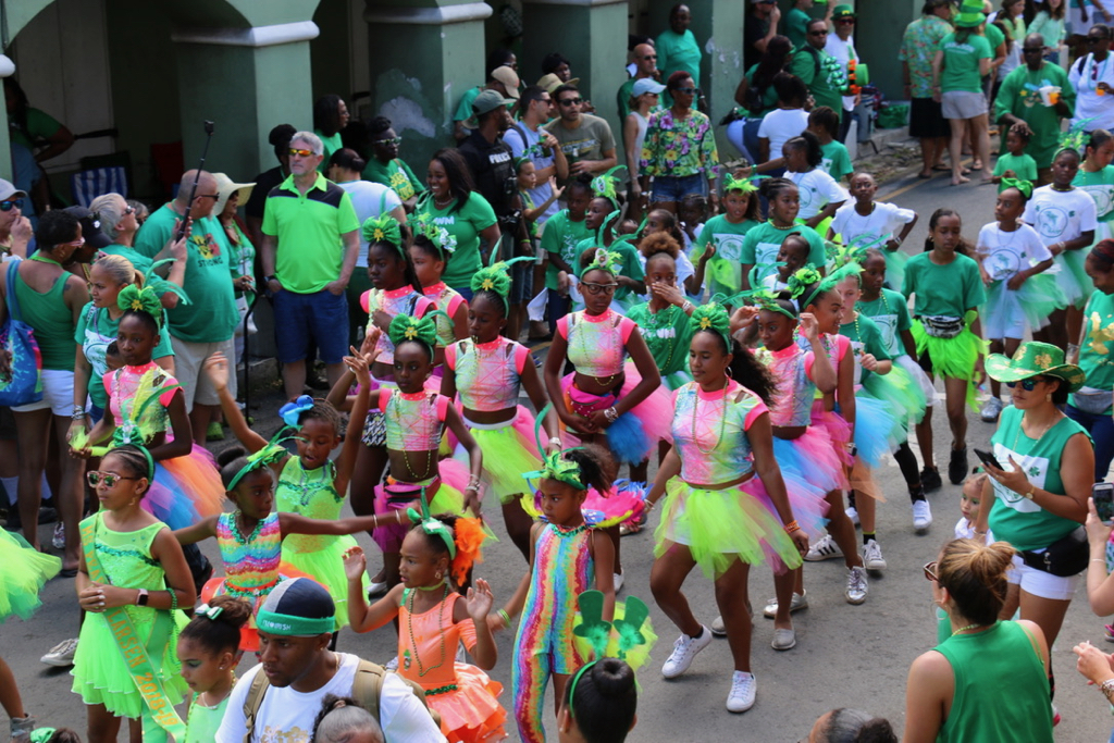 Students from Pearl B. Larsen Elementary School wore green – and almost every other color – as they danced through Christiansted Saturday. (Linda Morland photo)