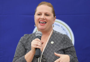 Acting Health Commissioner Justa Encarnacion tells the opening ceremony crowd that she is very excited about the opening of the the Health Department's temporary health center in St. Croix Thursday. (Government House photo)