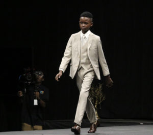 10-year-old John-Wycly Cetoute, of St. Croix, strides with confidence down the runway during the High Fashion Competition.