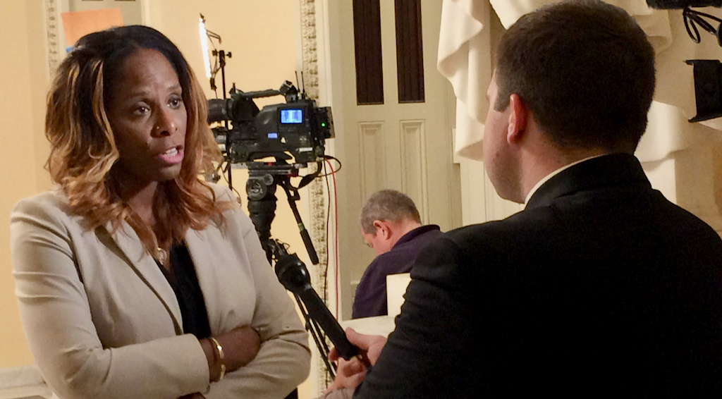 Stacey Plaskett talks to a TV reporter after leaving the House floor, where discussion on the Violence Against Women Act was going on. The measure passed with Plaskett's amendment increasing the funds allocated to the territories. (Don Buchanan photo)