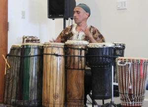 Master drummer Baba Tyehimba Mtu plays for the audience at the seventh for the audience at the seventh annual VICCC Symposium.