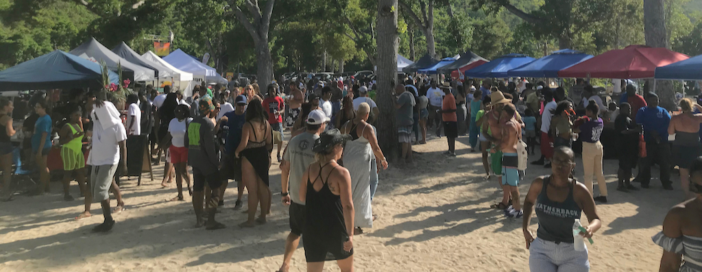 Event goers roam Magens Bay as they sample a variety of wings.