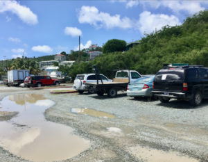 Notices were placed on vehicles in gravel parking lot. (Source photo by Amy Roberts)