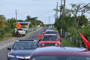 More than 100 people take part Saturday in the Caravan Red Flag on St. Croix.