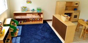 The childcare facility has many rooms supporting educational development. This room, filled with dolls and blocks, highlight themes of engineering and sociodramatic play. (Source photo by Bethaney Lee)