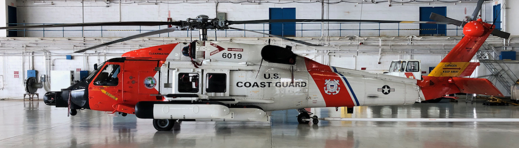 A Coast Guard Air Station Clearwater MH-60 Jayhawk helicopter sits in the hangar Coast Guard Air Station Borinquen, Puerto Rico on Thursday, the day after it was used in the rescue of a yacht during a hurricane. (U.S. Coast Guard photo by Lt. Carlos Gonzalez)