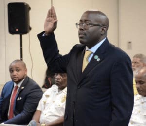 Trevor Velinor is sworn in before testifying before the Committee on Rules and the Judiciary. (Photo from LEGVI Facebook page)