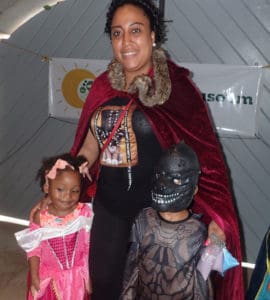 Liza Pena dressed up with her grandchildren Azaya and Ayden Kelly. (Source photo by Susan Ellis)