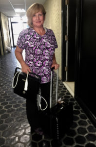 Georgia Moorman is ready to travel with her portable echocardiogram equipment. (Source photo by Susan Ellis)