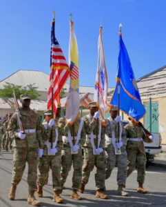 The Color Guard of the USVI Army National Guard carries the flag high. (Source photo by Linda Morland)