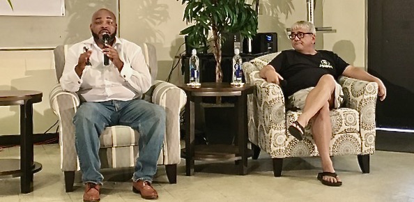 Austin Wright and Dr. Manny DaCosta speak at the cannabis forum. (Source photo by Susan Ellis)