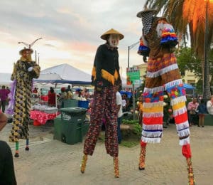 Yisrael Petersen and his moko jumbie team entertained residents throughout the evening. (Source photo by James Gardner)