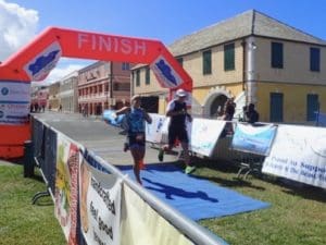 Catherine Sequin and Troy Holloway cross the finish line together. (Source photo by Susan Ellis)