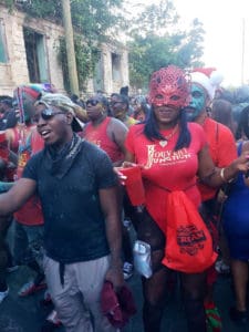 Masked revelers stream through town. (Source photo by Melody Rames)