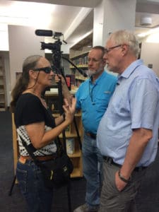 Zandi Hillis Starr and Rick Starr talk with Rasmussen. (Source photo by Don Buchanan)