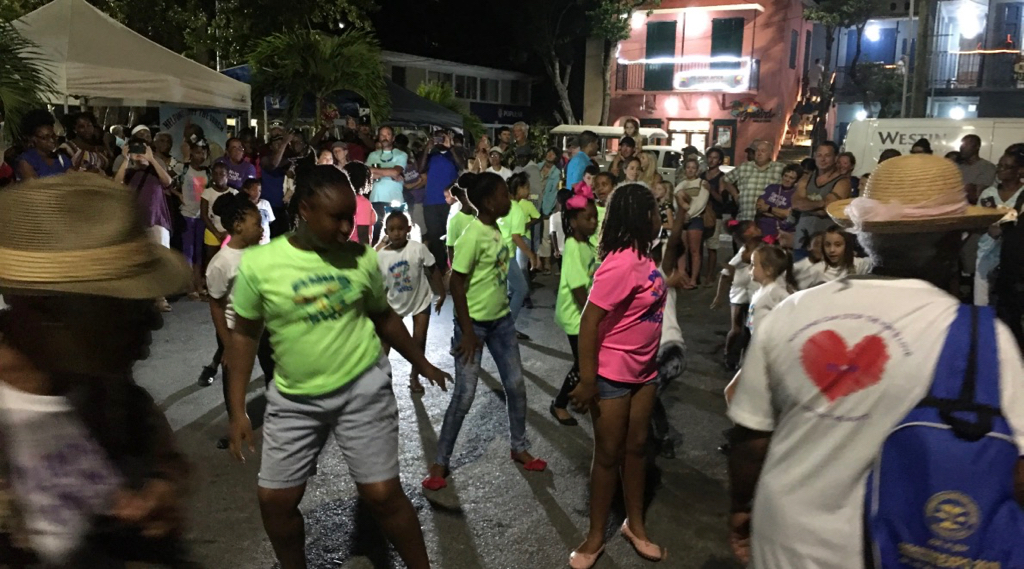 Dancers take to the streets of Cruz Bay. (Source photo by Amy Roberts)