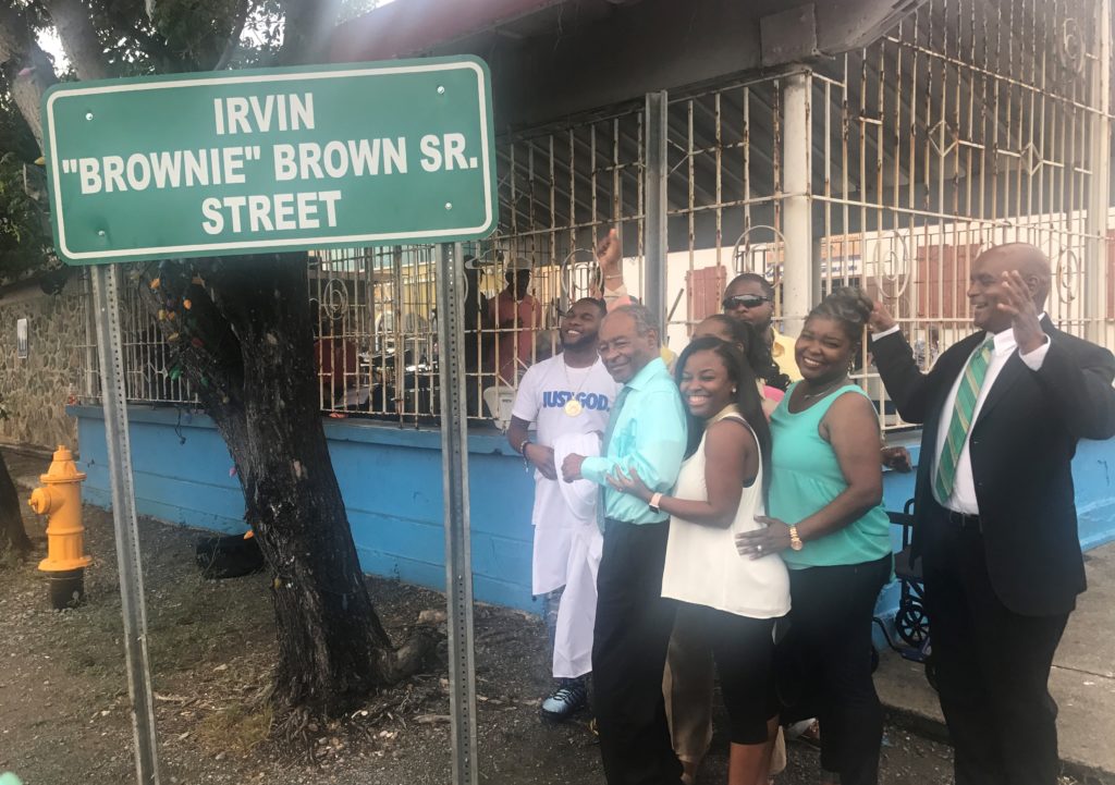 Friends, family and admirers see unveiling of new sign naming Irvin “Brownie” Brown Sr. Street in September.