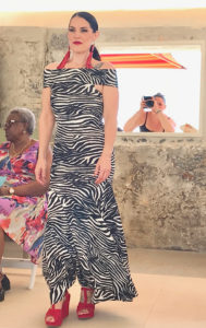 Courtney Mills models a zebra print maxi dress from MGC. (Source photo by Elisa McKay)