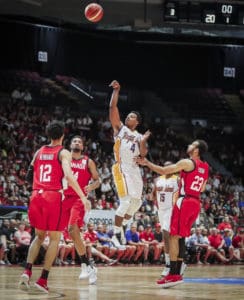 Georgio Milligan attempts a floater against Canada in a recent USVI national team game. (Photo submitted by FIBA Basketball)