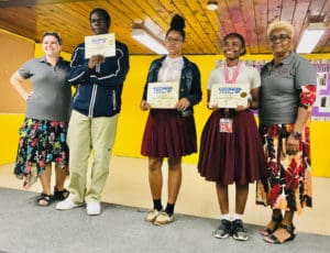 From left, Central High teacher Amber Aragi, Eugene Jah’ky, first-place winner Quishylah Navaro, Aniya Celeltin, and Teacher Justina Joseph. (Submitted photo)