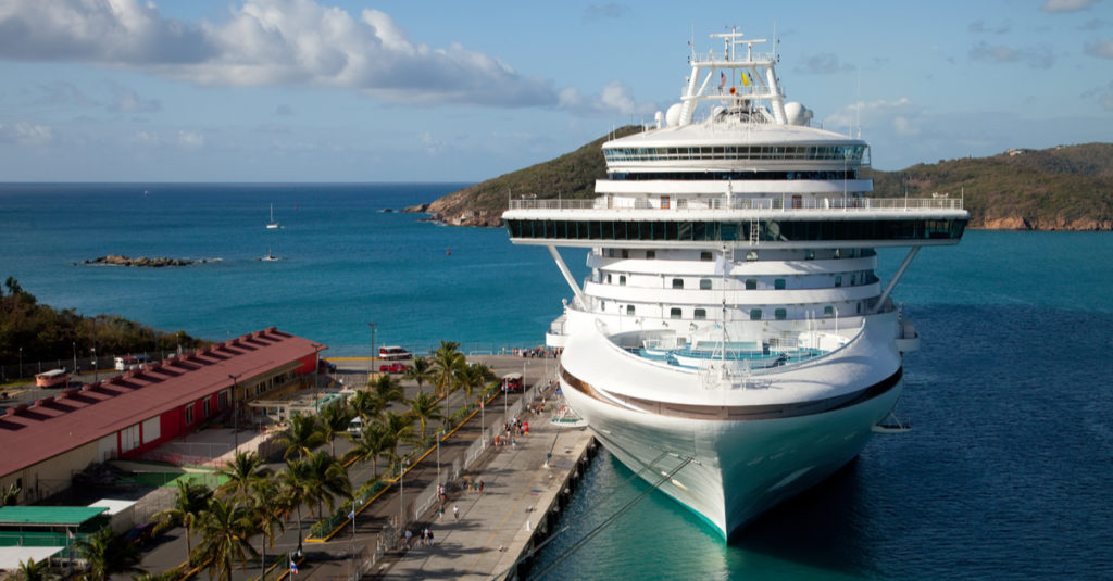 A cruise ship docks at the WICO dock on St. Thomas. During the ongoing Coronavirus pandemic the sight of cruise ships at the pier has become a memory. (Shutterstock)