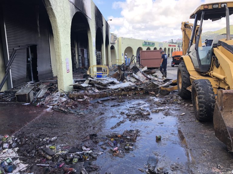 Parts of Wheatley Center Still Smoldering Thursday as Businesses Clean Up