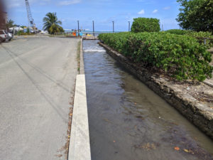 A seawater wave inundates a drainage gut in Christiansted. (Photo submitted by Hilary Lohmann, DPNR, and Greg Guannel, UVI)