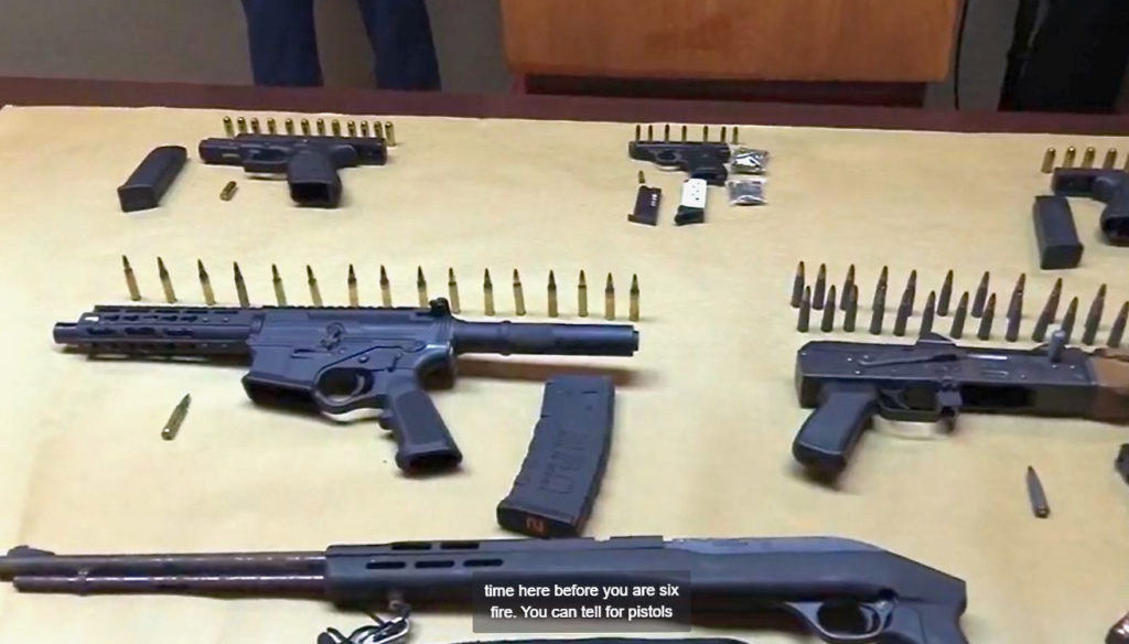 Pistols and assault rifles confiscated in Hospital Ground over the past week were on display during Tuesday’s news briefing.