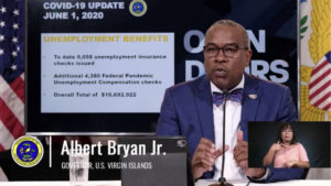 Gov. Albert Bryan, Jr. urges residents to support local police officers as protests reach a tipping point on the mainland.