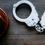 arrest police court handcuffs gavel cops