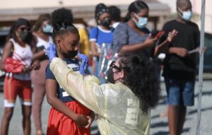 A young student gets tested for COVID-19 this week as part of the Health Department's effort to assure a safe return to school following Carnival celebrations on St. Thomas. (V.I. Health Department photo)